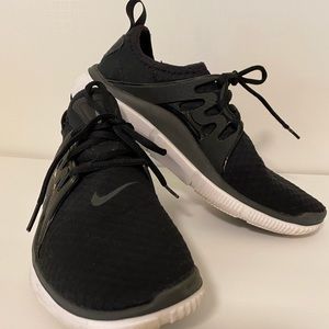 Nike Black and White Running Shoes.